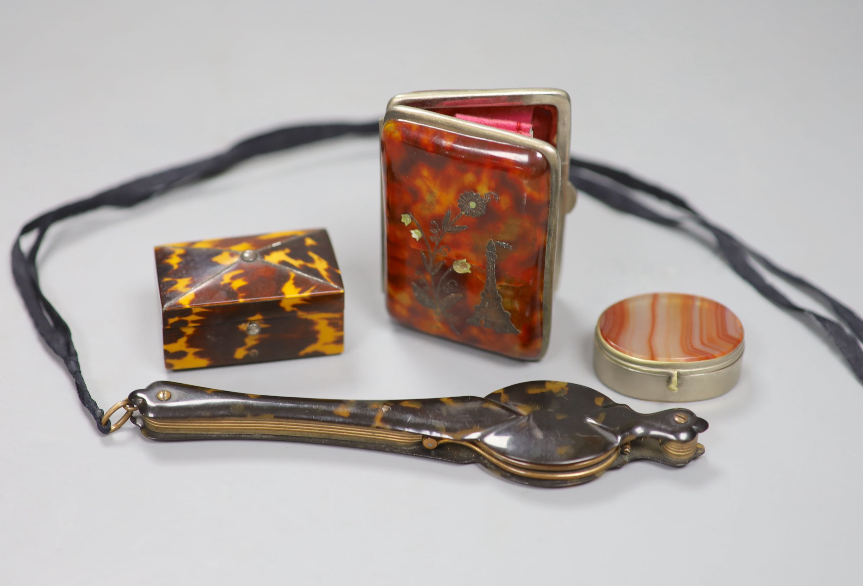 A tortoiseshell box, a purse and lorgnettes and a hardstone box